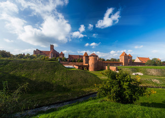 Fototapeta na wymiar Teutonic Knights in Malbork castle in autumn. World Heritage List UNESCO