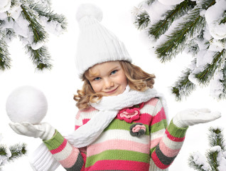 girl in winter clothes christmas tree covered with snow