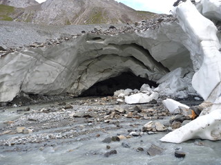 cave in the white ice of the glacier