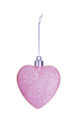 Pink heart tree ornament. A Christmas sparkling bauble on string isolated.