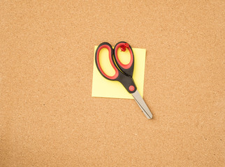 Office message board with paper and scissors