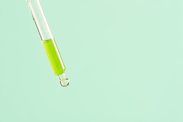 Dropper with green liquid