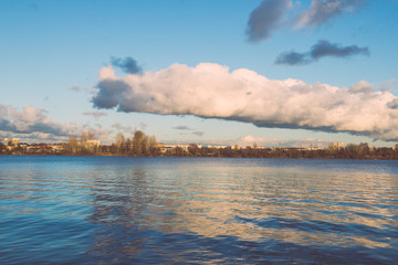 White clouds over the river - vintage effect
