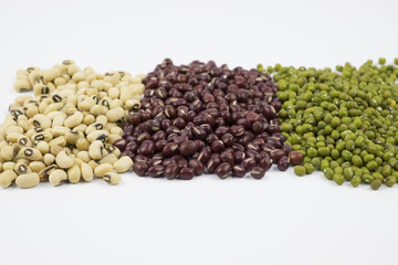 Black eye peas, mung bean and adzuki beans on white background
