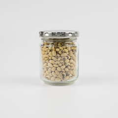 Black eye peas  beans in a mason jar over white background