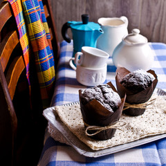 Chocolate muffin in baking paper