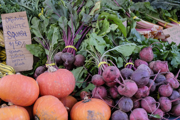 Organic fall vegetables for sale at a California farmers market.
