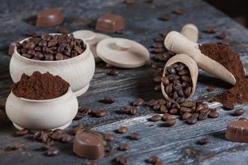  different varieties of coffee beans on dark vintage background
