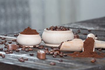  different varieties of coffee beans on dark vintage background