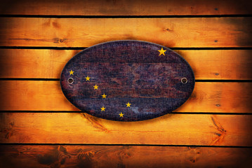 Obraz na płótnie Canvas Wooden alaska flag.