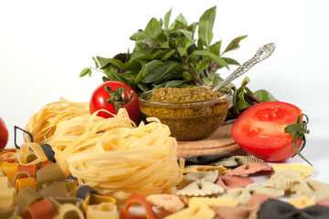 Italian Pasta ( with tomatoes, olive oil and basil) and wine on a white background