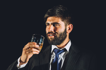 Man enjoying a glass of alcohol