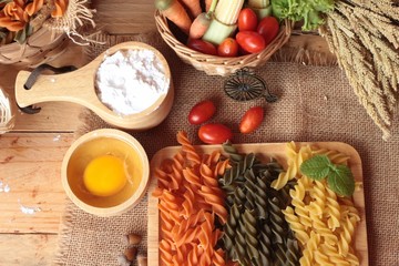 Raw homemade italian pasta colorful for cooking.