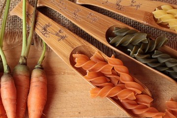 Raw homemade italian pasta colorful for cooking.