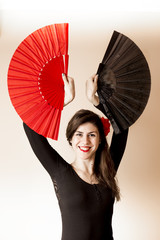 Girl posing with a  fan