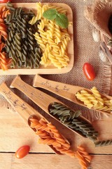 Raw homemade italian pasta colorful for cooking.