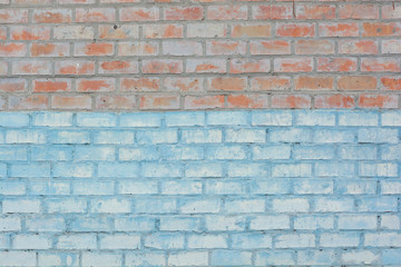 Obraz premium Brick wall of red and blue