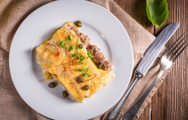 Cannelloni with mince filling and capers