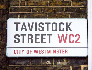 Tavistock street sign  in City of Westminster at Central London, United Kingdom