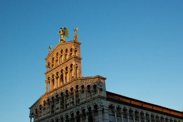 Angel statue on top of medieval church