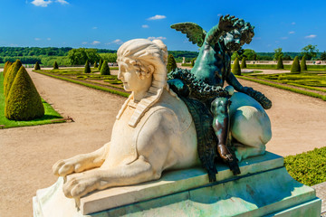 Sculptures in garden of Versailles Palace. Versailles, France.