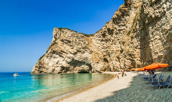 Paradise Beach, Corfu Island, Greece. Paradise Beach is one of the most beautiful beaches in Corfu Island. It is located near Liapades village at south of Paleokastritsa
