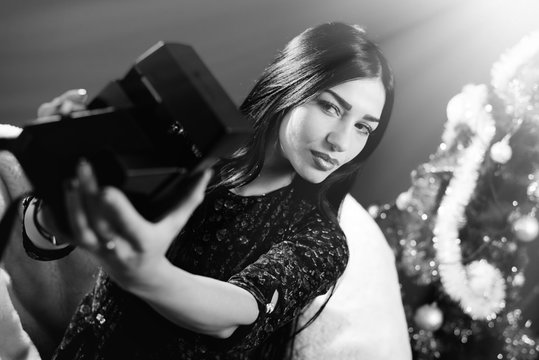 Black and white portrait of beautiful glamour lady having fun making selfy picture