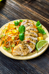 Roasted chicken breast with vegetable, basil and lime
