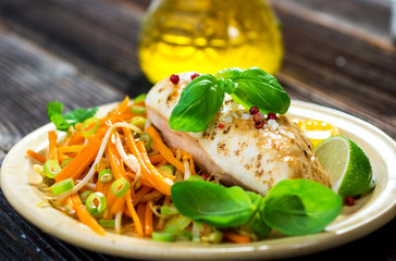 Roasted chicken breast with vegetable, basil and lime
