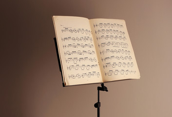 Plakat Music stand on brown background
