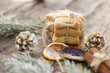 Christmas background with christmas gingerbread cookies on wooden