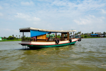 Fototapeta na wymiar A tourist taxi boat on the Chao Phraya River in Bangkok, Thailan