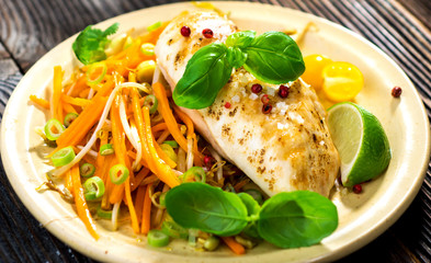 Roasted chicken breast with vegetable, basil and lime

