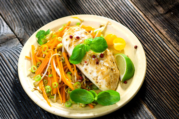 Roasted chicken breast with vegetable, basil and lime
