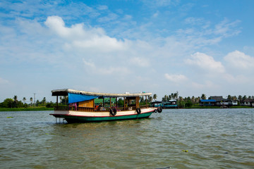 Fototapeta na wymiar A tourist taxi boat on the Chao Phraya River in Bangkok, Thailan
