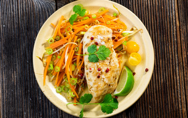 Roasted chicken breast with vegetable, coriander and lime