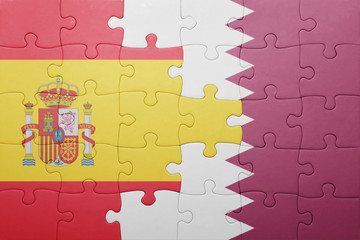 puzzle with the national flag of spain and qatar