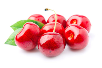 Cherry fruits close up on white