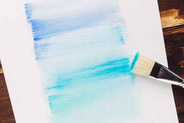 Paintbrush painting watercolor on paper