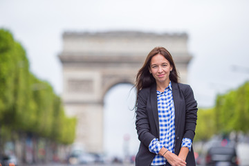 Young woman on the Champs Elysees in Paris