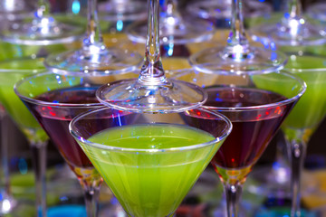 bright colored cocktail with juice and alcohol