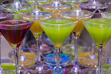 bright colored cocktail with juice and alcohol