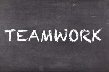 Fototapeta premium Teamwork, concept on school blackboard or chalkboard