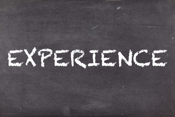 Experience, concept on school blackboard or chalkboard