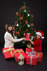mother and daughter with gift box