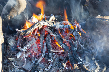 Bonfire/The texture of fire among the stones of fire inspections, a lot of ash