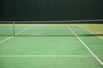 empty green tennis court