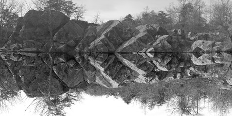 Rocks near the water in Great Falls Park, Maryland, USA. Geometry of rock formations highlighted by...
