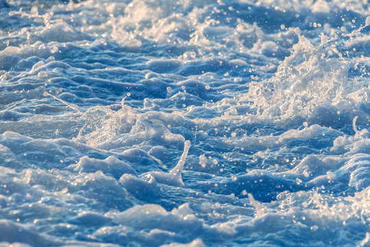 Restless water. Waves. Tur- bulent the sea