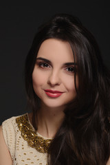 Naklejka premium Close-up portrait of a beautiful young girl